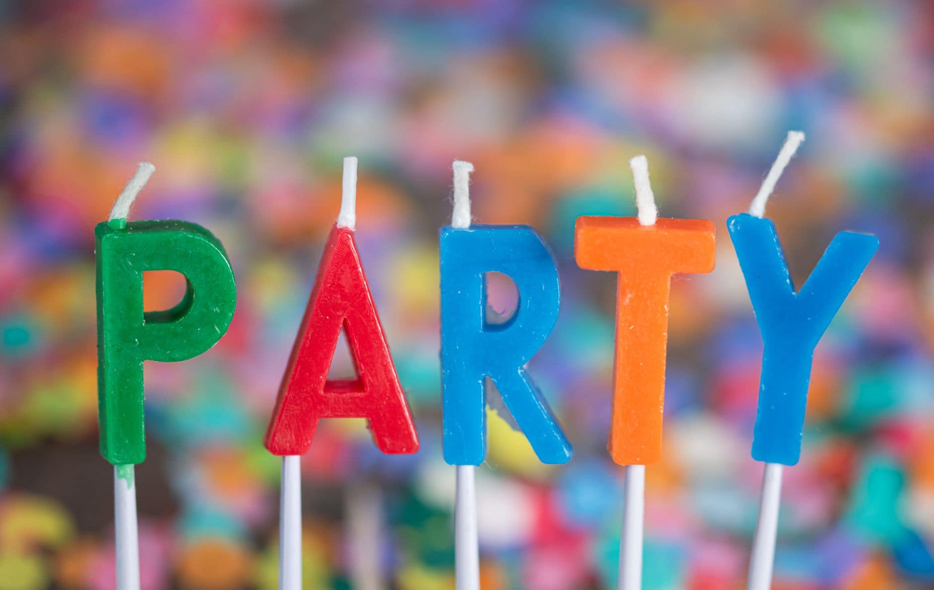 Vibrant party-themed candle letters spelling 'party' for festive occasions.